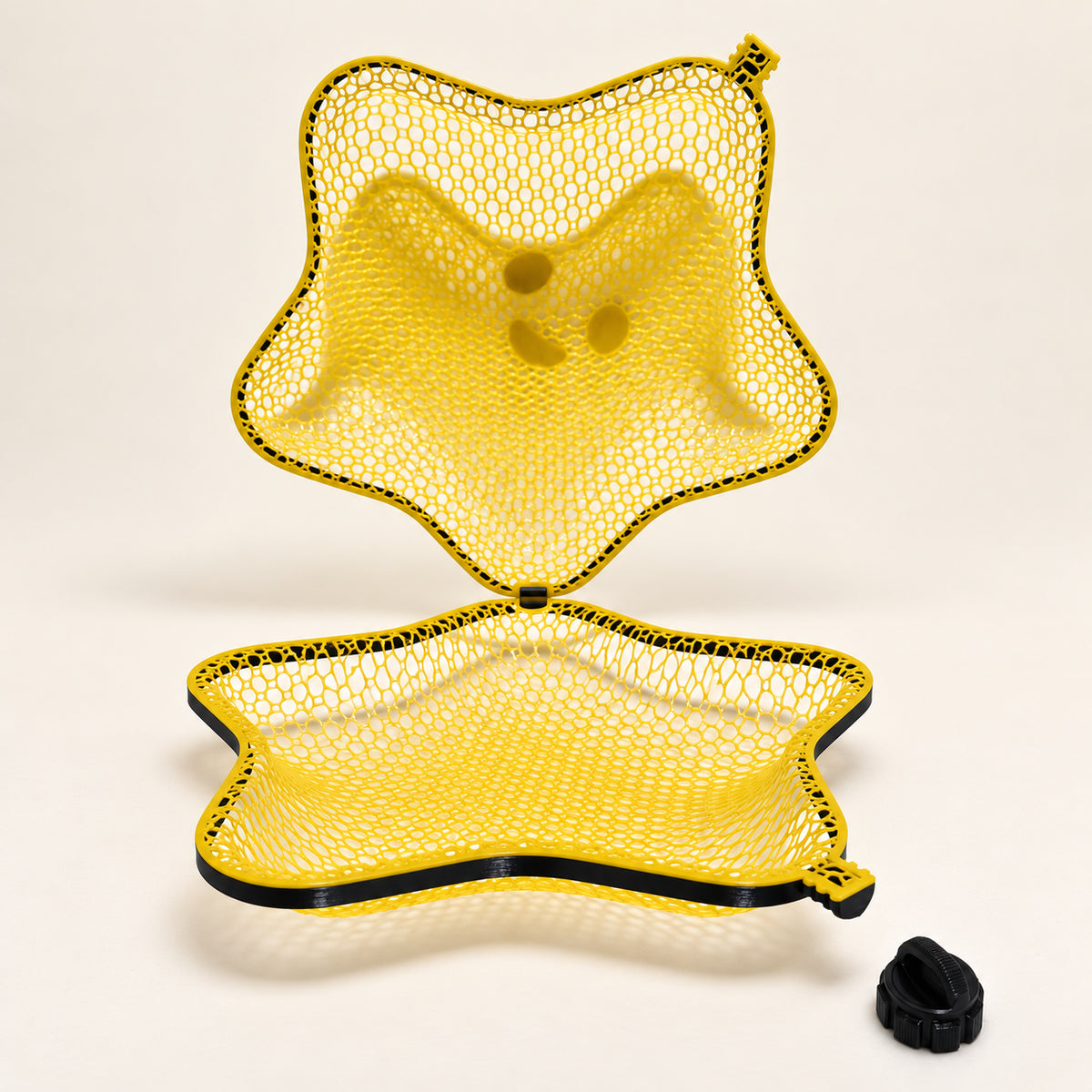 Digitally enhanced open-star view showing yellow mesh interior, black rim and separate hanging cap